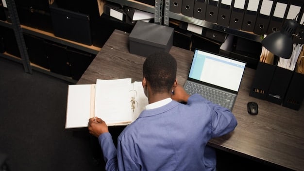 A journalist sits at a desk, surrounded by documents and a computer screen, with a hand covering a phone receiver, suggesting a confidential conversation and the ethical dilemma of protecting sources versus informing the public.