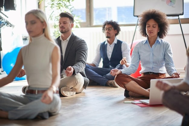A company offering a wellness workshop to employees. The employees are participating in a mindfulness exercise, seated comfortably in a circle in a modern office space. The atmosphere is calm and supportive, emphasizing the importance of mental health and well-being.