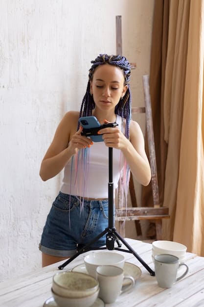 A person using the Instagram Reels feature on their smartphone, with various editing options visible on the screen. The background shows a visually appealing scene, as if the person is about to record a Reel.